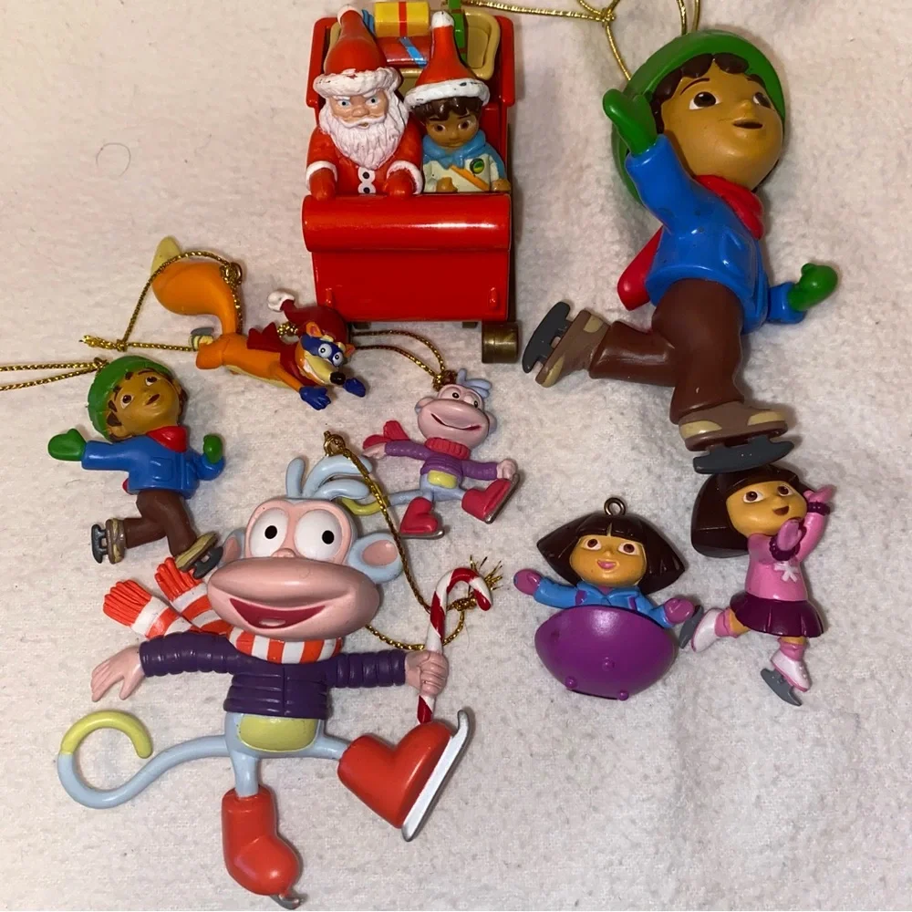 Go Diego and Dora holiday ornament characters with boots, swiped and Santa too!